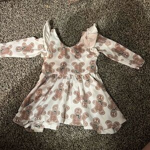 Monica + Andy gingerbread dress. 6-12 months. No known flaws. GUC.